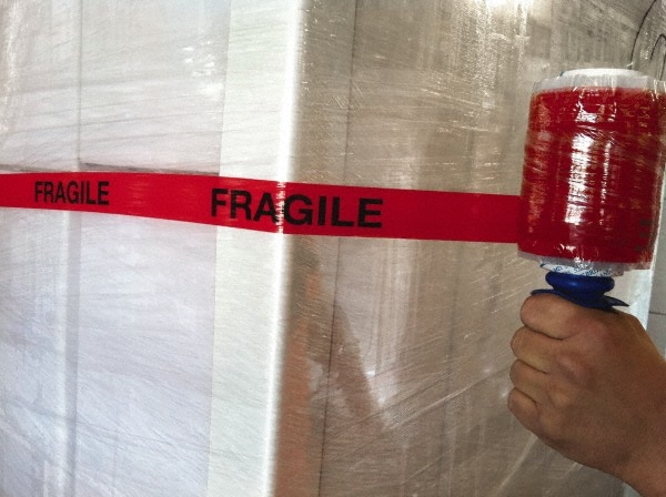 5" x 500' 60 Gauge Clear with Fragile Imprint Hand Held Stretch & Pallet Wrap with Extended Core