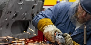 man using an abrasive