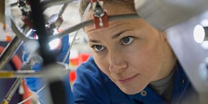 Woman looking at a tool