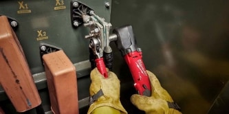 worker working using a Milwaukee hand tool
