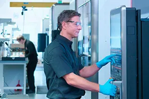 machinist operating a cnc machine