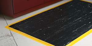 a mat lined with tape