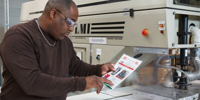 man looking at a Lockout tagout plan