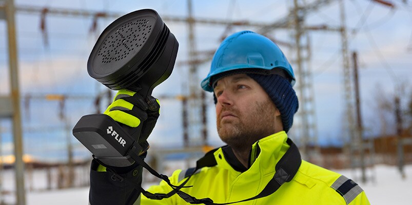 worker using FLIR SI2 Industrial Acoustic Imaging Camera