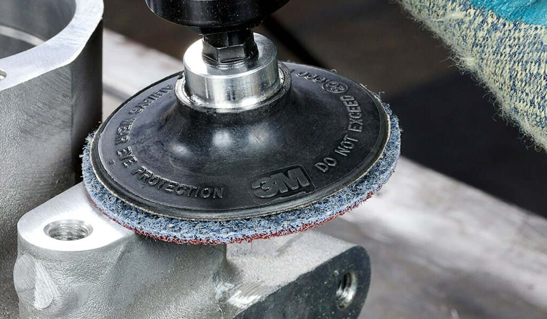 image of Scotch-Brite disc in use