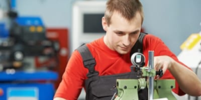 image of man working in shop