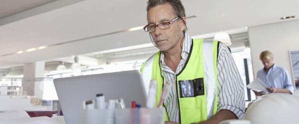 image of worker on laptop